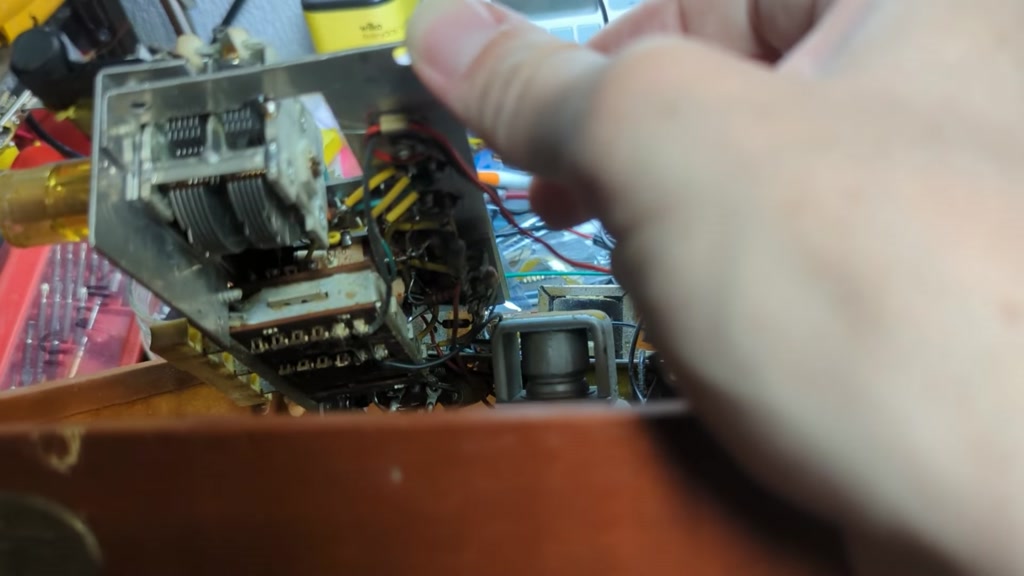 The underside is fairly clean and is a mass of point to point wiring