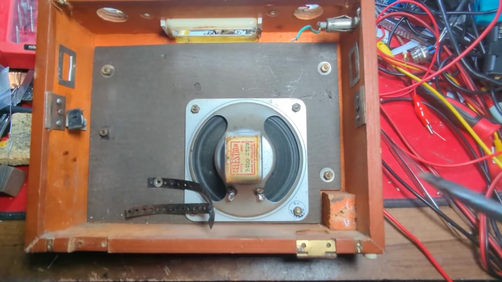 With the RF and the audio boards out, the speaker is left in place and the external antenna Jack is left in place