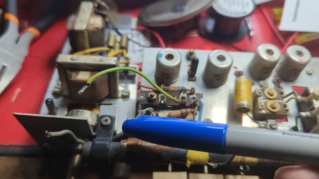 Broken wire against the tip of the pen